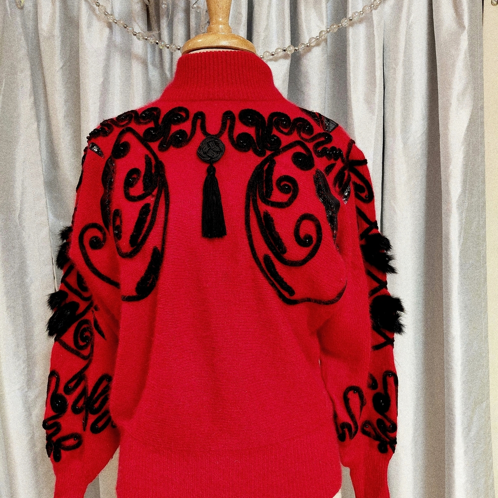 Chic Red Turtleneck Sweater with Black Detailing